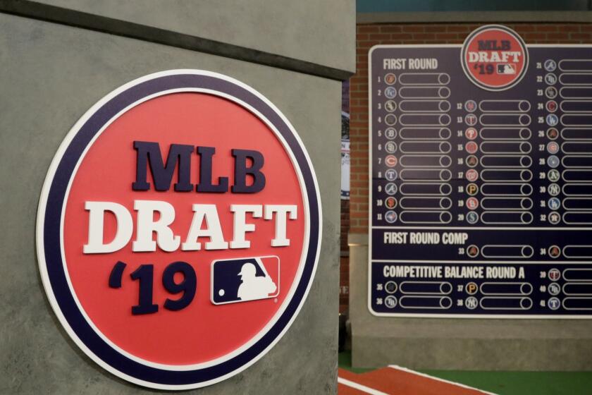 The rostrum is viewed at the MLB Network prior to the first round of the Major League Baseball draft, Monday, June 3, 2019, in Secaucus, N.J. (AP Photo/Julio Cortez)