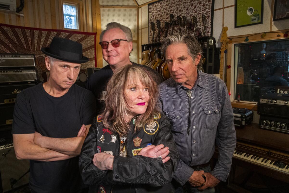 X just released its first album with its original lineup in 35 years. From left: drummer D.J. Bonebrake, guitarist Billy Zoom, vocalist Exene Cervenka and vocalist-bassist John Doe.