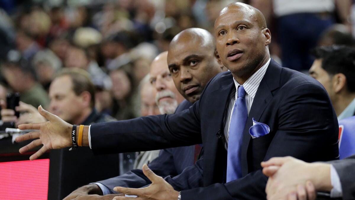 Lakers Coach Byron Scott and GM Mitch Kupchak have said little about the coach's status with the team heading into the final two months of the season.