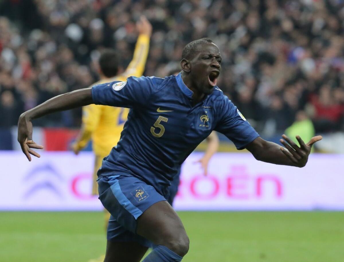 Mamadou Sakho celebrates his second goal of the game during France's 3-0 victory.