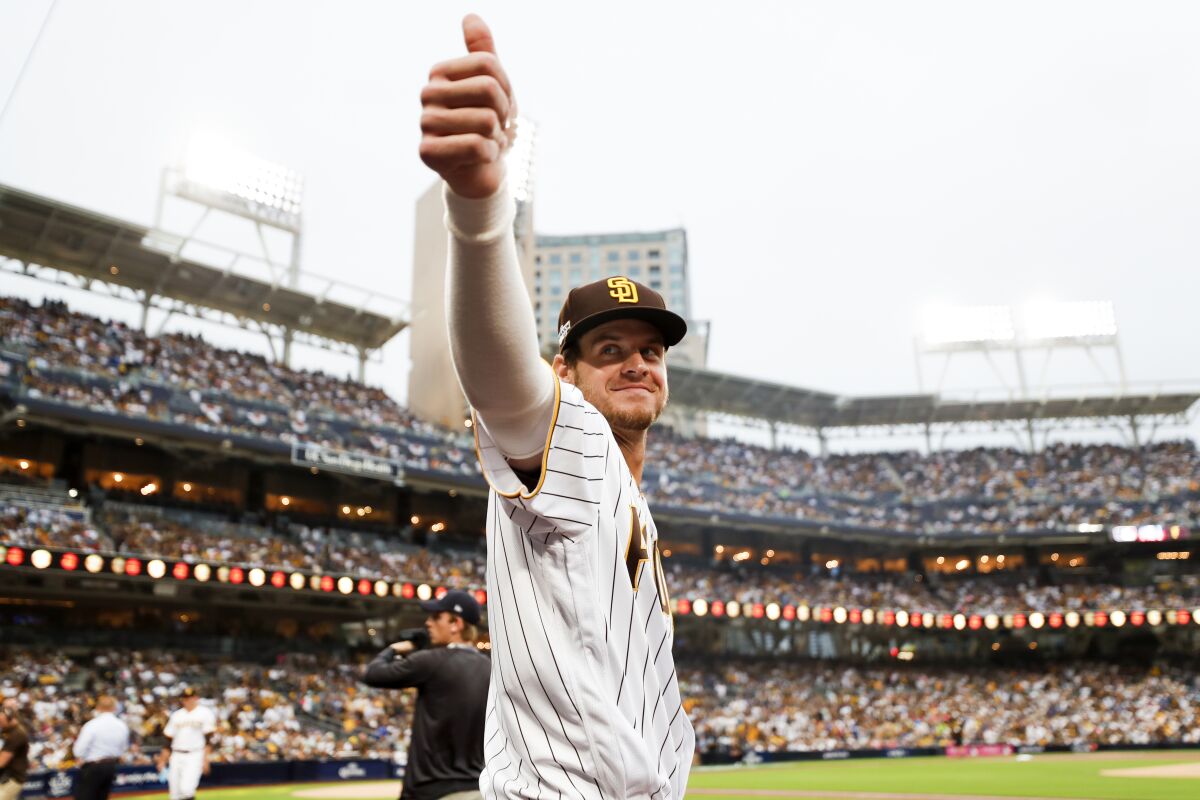 The Padres' Wil Myers gives a thumbs up to the fans 