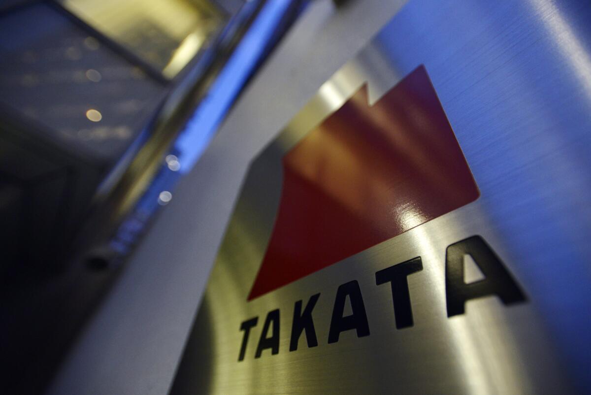 Federal safety regulators are fining auto parts supplier Takata Corp. $14,000 a day for not cooperating with a probe into the company's exploding automobile air bags.