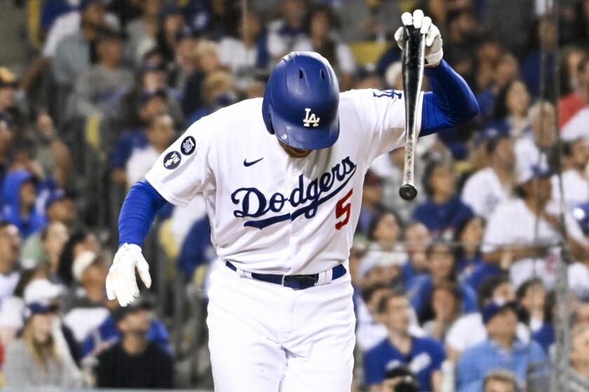 Dodgers first baseman Freddie Freeman reacts after flying out during the fifth inning