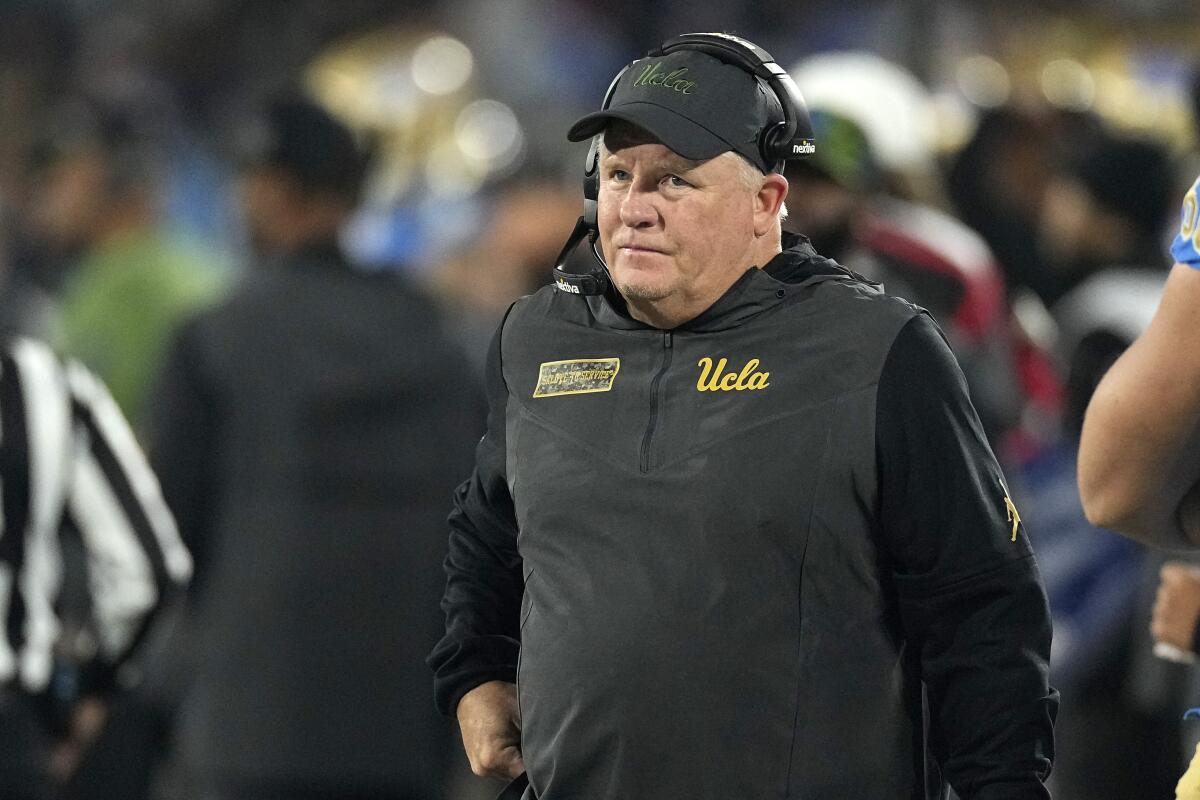 UCLA coach Chip Kelly stands on the sideline during a loss to Arizona on Nov. 12.