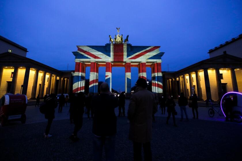 The Brandenburg Gate in Berlin is illuminated with the colors of the British flag to pay tribute to the victims of the terrorist attack in London.