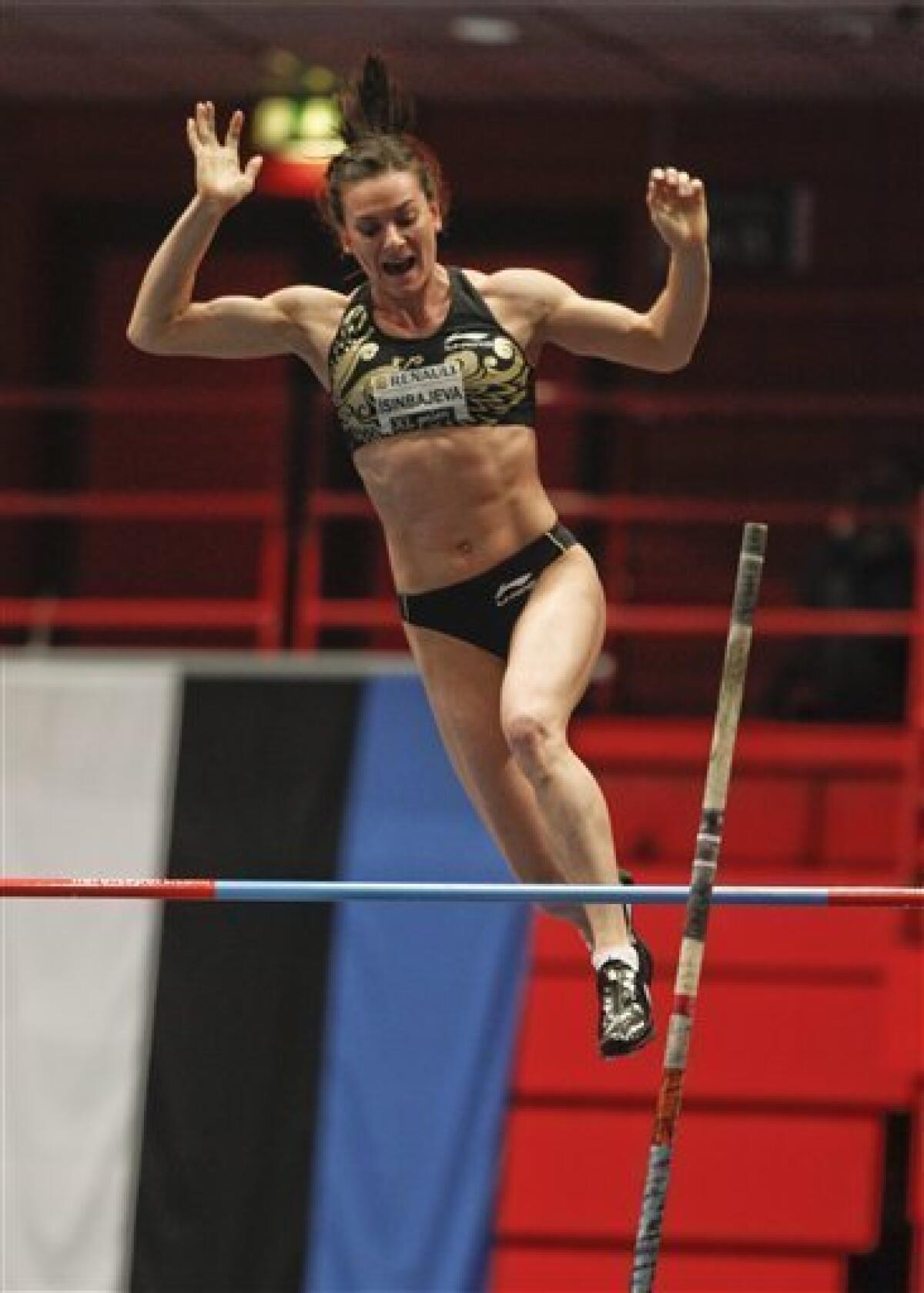 Yelena Isinbayeva of Russia reacts as she competes to win the women's pole vault during the XL-Galan Indoor athletics meeting in Stockholm, Sweden, Thursday Feb. 23, 2012. (AP Photo / Fredrick Persson) SWEDEN OUT