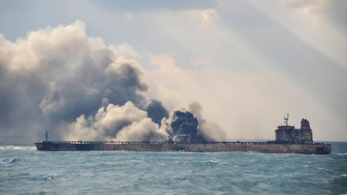 Smoke and flames spew from the burning Iranian oil tanker Sanchi off the coast of eastern China on Jan 9.