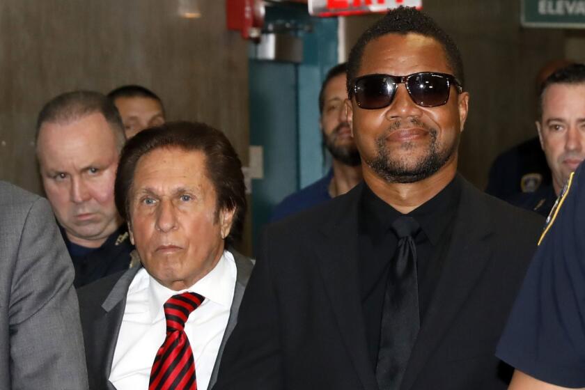 Cuba Gooding Jr., right, with his attorney Mark Heller, arrives at criminal court in New York, Wednesday, June 26, 2019. Lawyers for Cuba Gooding Jr. are providing a court with video they say will show the actor did not grope a woman at a New York City bar. (AP Photo/Richard Drew)