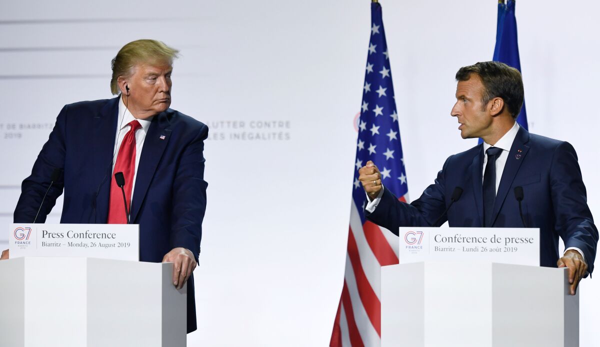 President Trump holds a news conference with French President Emmanuel Macron. 