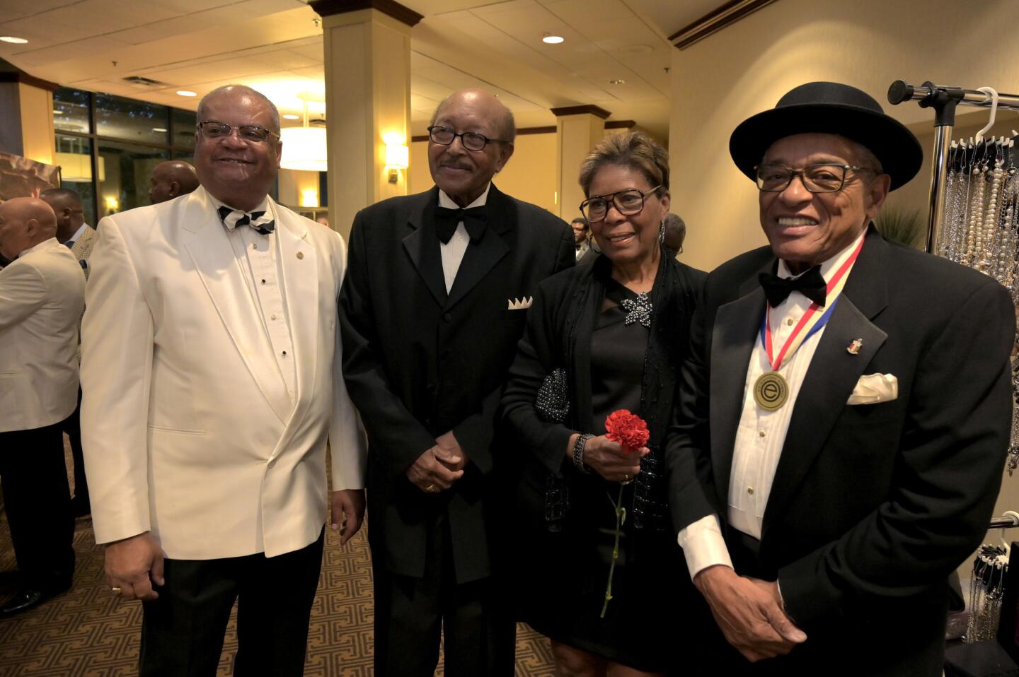 Nathan Fletcher, Rufus Clanzy, Queen Carr and Walter Carr, at the Kappa Alpha Psi Scholarship Foundation of Columbia's Black & White Soirée.