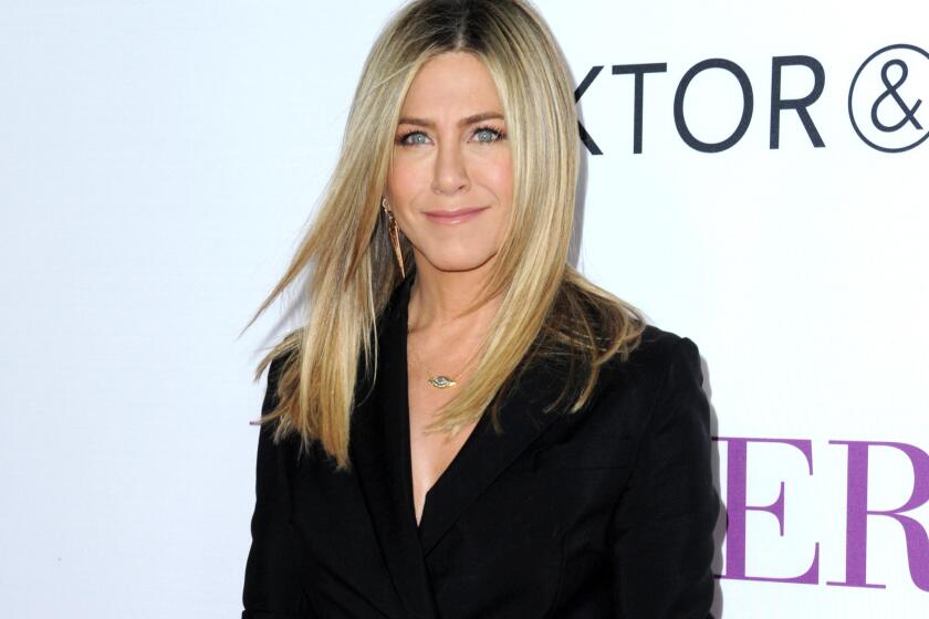 Jennifer Aniston arrives at the Los Angeles premiere of "Mother's Day" in April 2016. Aniston says she’s not pregnant and she’s fed up with predatory tabloid culture that defines women by their looks and maternal status.