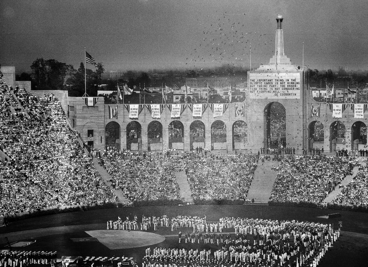 Doves are released during the opening ceremonies of the Tenth Olympiad at the Coliseum in Los Angeles.