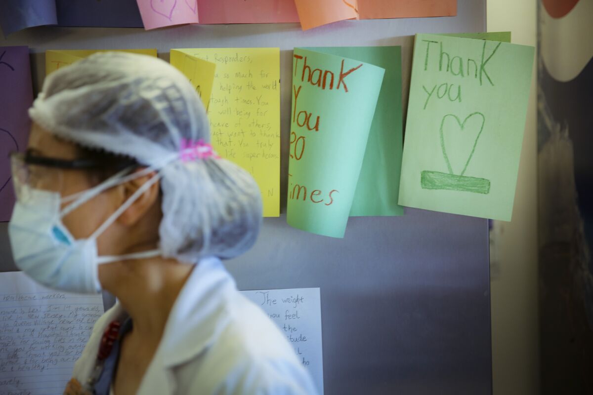 FILE - In this May 29, 2020, file photo, letters of thanks from students adorn the walls of a break room that was set up for workers to decompress from the stresses of caring for COVID-19 patients at Elmhurst Hospital, in New York. As the coronavirus pandemic surges across the nation and infections and hospitalizations rise, medical administrators are scrambling to find enough nursing help — especially in rural areas and at small hospitals. (AP Photo/Robert Bumsted, File)