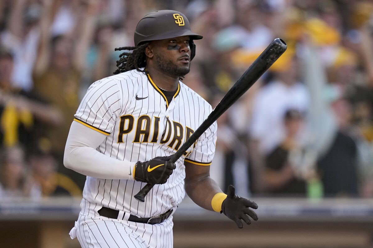 FILE - San Diego Padres' Josh Bell watches hit RBI-single during the fifth inning in Game 2 of the baseball NL Championship Series between the San Diego Padres and the Philadelphia Phillies on Oct. 19, 2022, in San Diego. The Cleveland Guardians and slugging first baseman Bell have agreed to a $33 million, two-year contract, according to a person familiar with the negotiations. The person spoke to The Associated Press on Tuesday, Dec. 6, 2022, on condition of anonymity because the deal was pending a review of medical records. (AP Photo/Brynn Anderson, File)