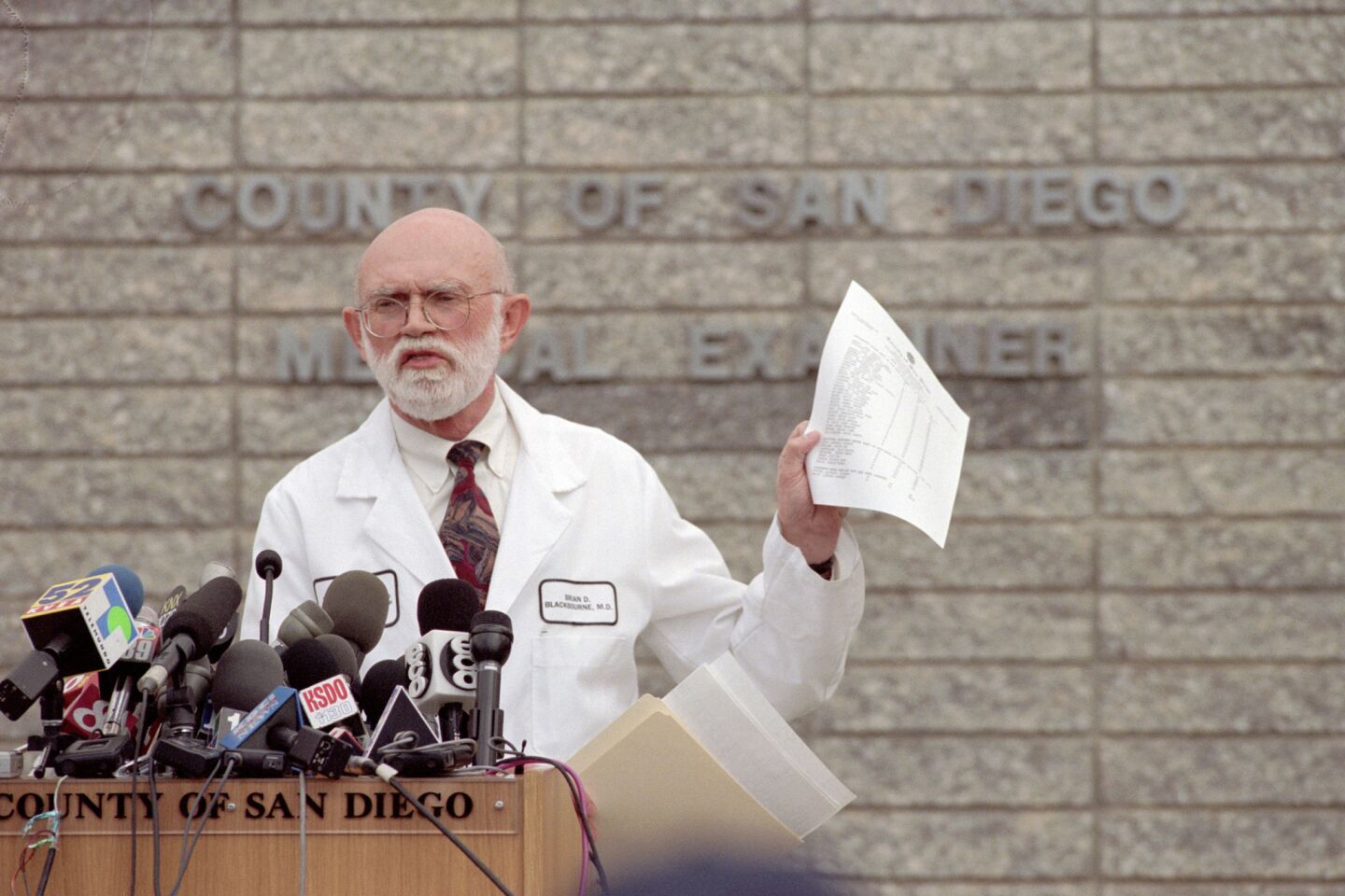 On March 31, 1997, county Medical Examiner Brian Blackbourne showed the updated list of names of the 39 Heaven's Gate members who died in a mass suicide that month in Rancho Santa Fe.
