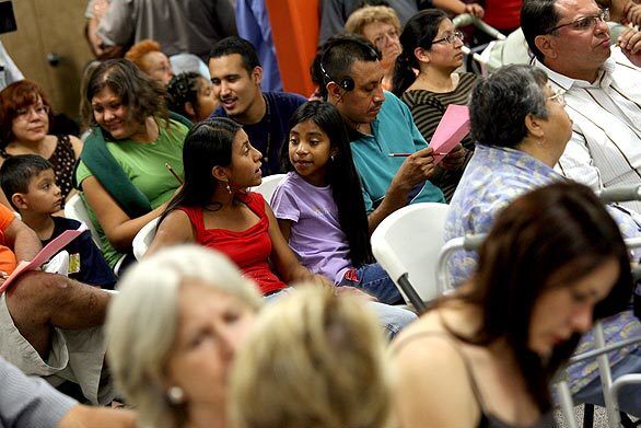 The main room at the Glassell Park Community Center is filled with residents who turned out en masse to learn details about the authorities' massive sweep of gang members Wednesday.