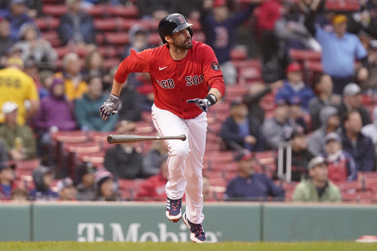 J.D. Martinez hits a three-run home run for the Boston Red Sox in October.