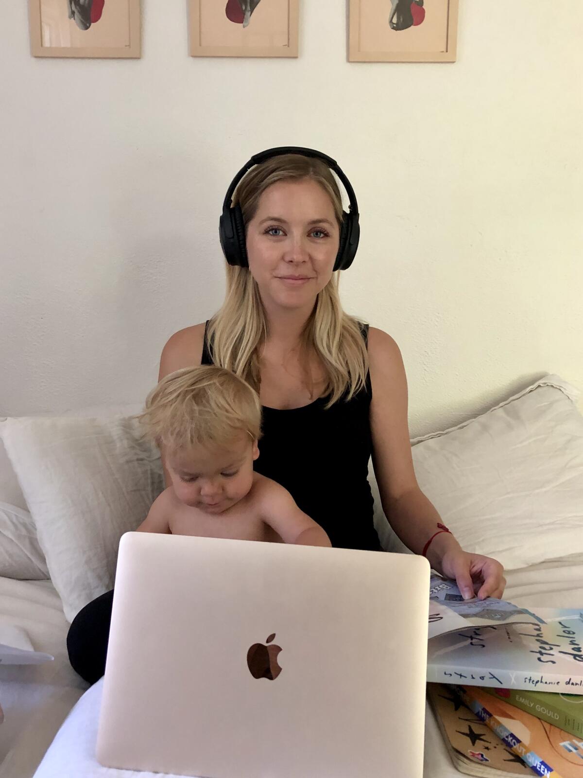 Stephanie Danler juggling parenting and book promotion from her quarantine home office (bed).