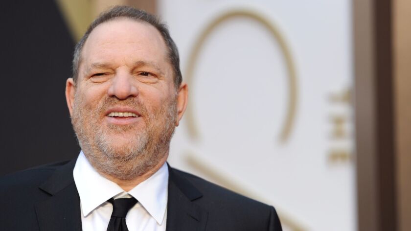 Harvey Weinstein arrives on the red carpet for the 86th Academy Awards on March 2, 2014.