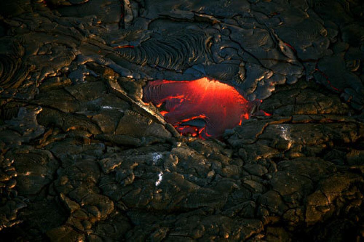 Molten lava inside Hawaii Volcanoes National Park.