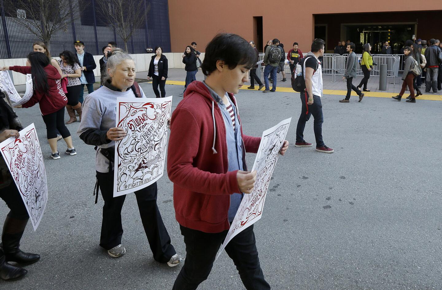 UC students and supporters march outside of the regents meeting in San Francisco.