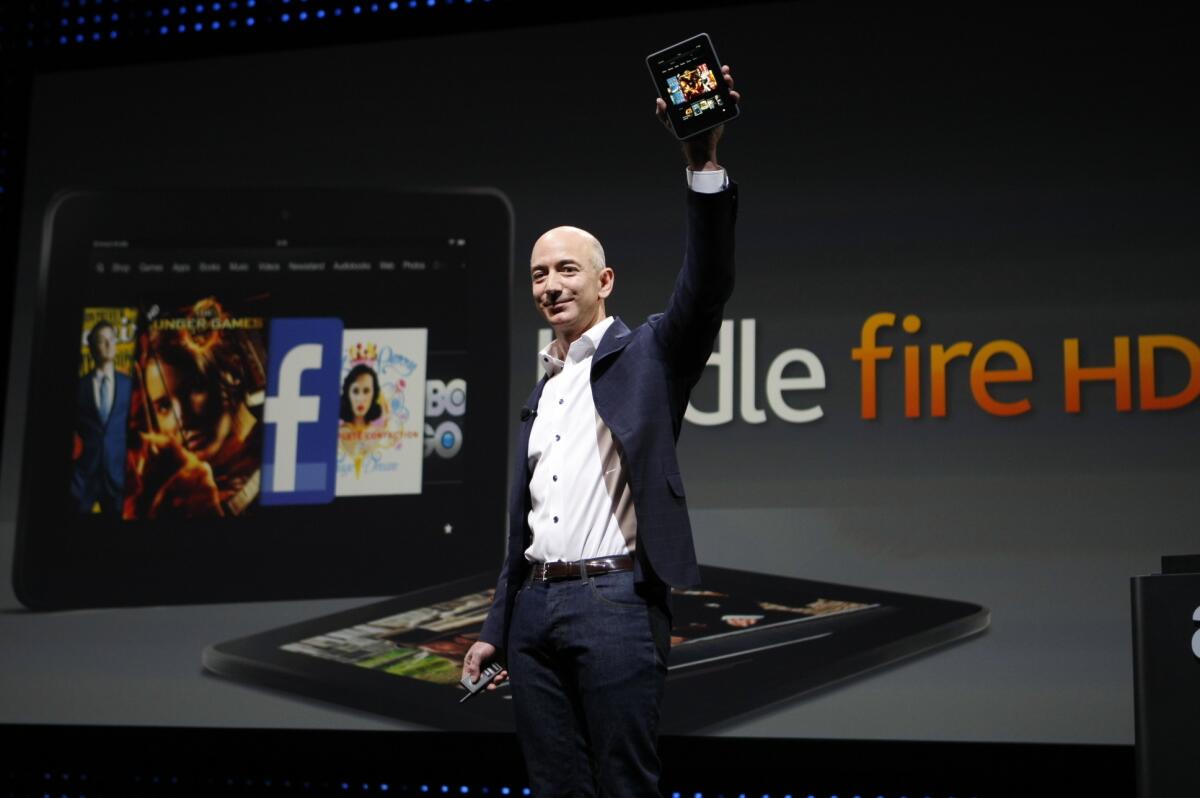 Amazon CEO Jeff Bezos unveils the Kindle Fire HD in 2012. (Al Seib / Los Angeles Times)