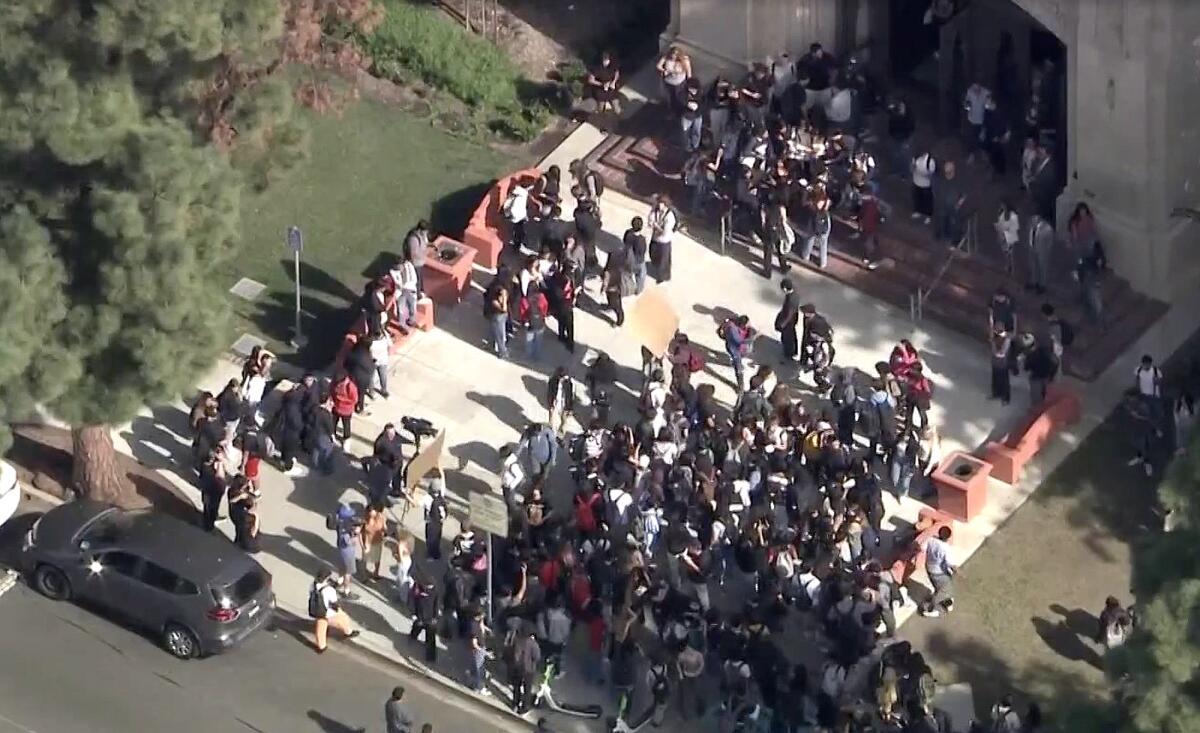 Aerial photo of students walking out of their high school.