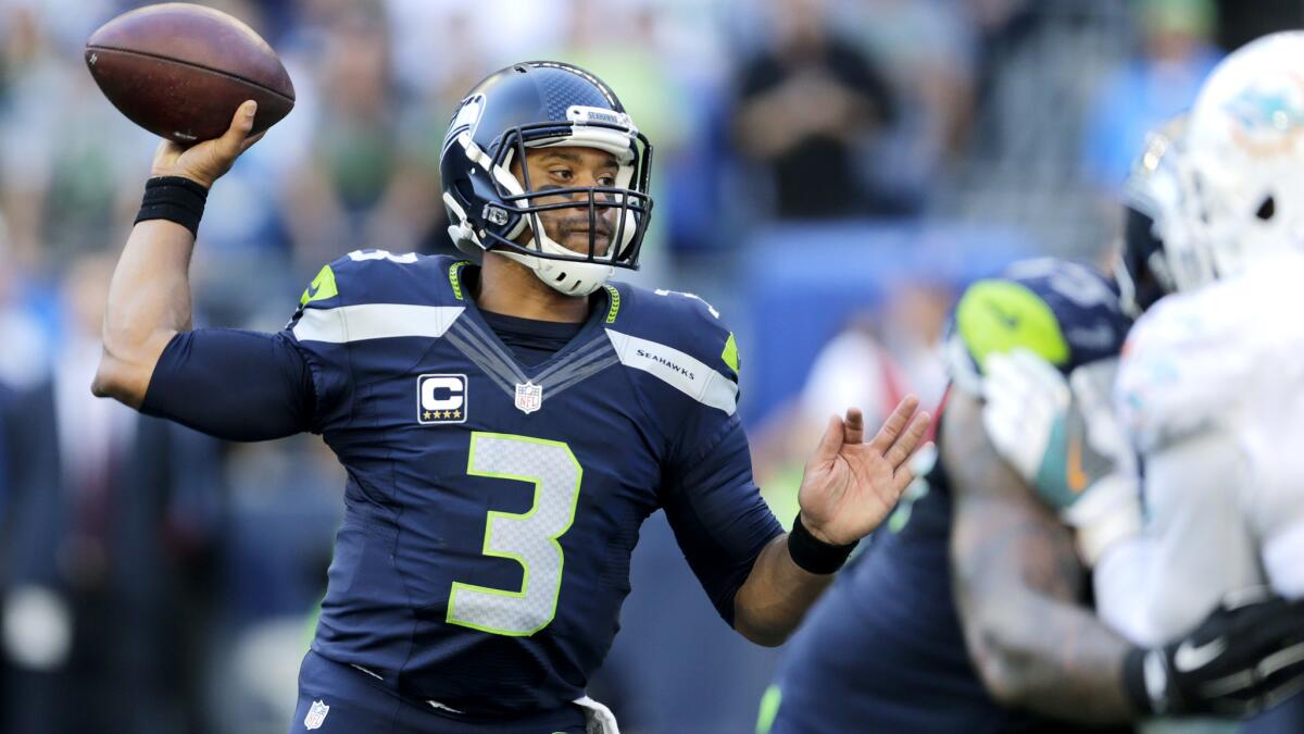 Russell Wilson and the Seahawks will try to improve to 7-3-1 when hosting the Eagles on Sunday.