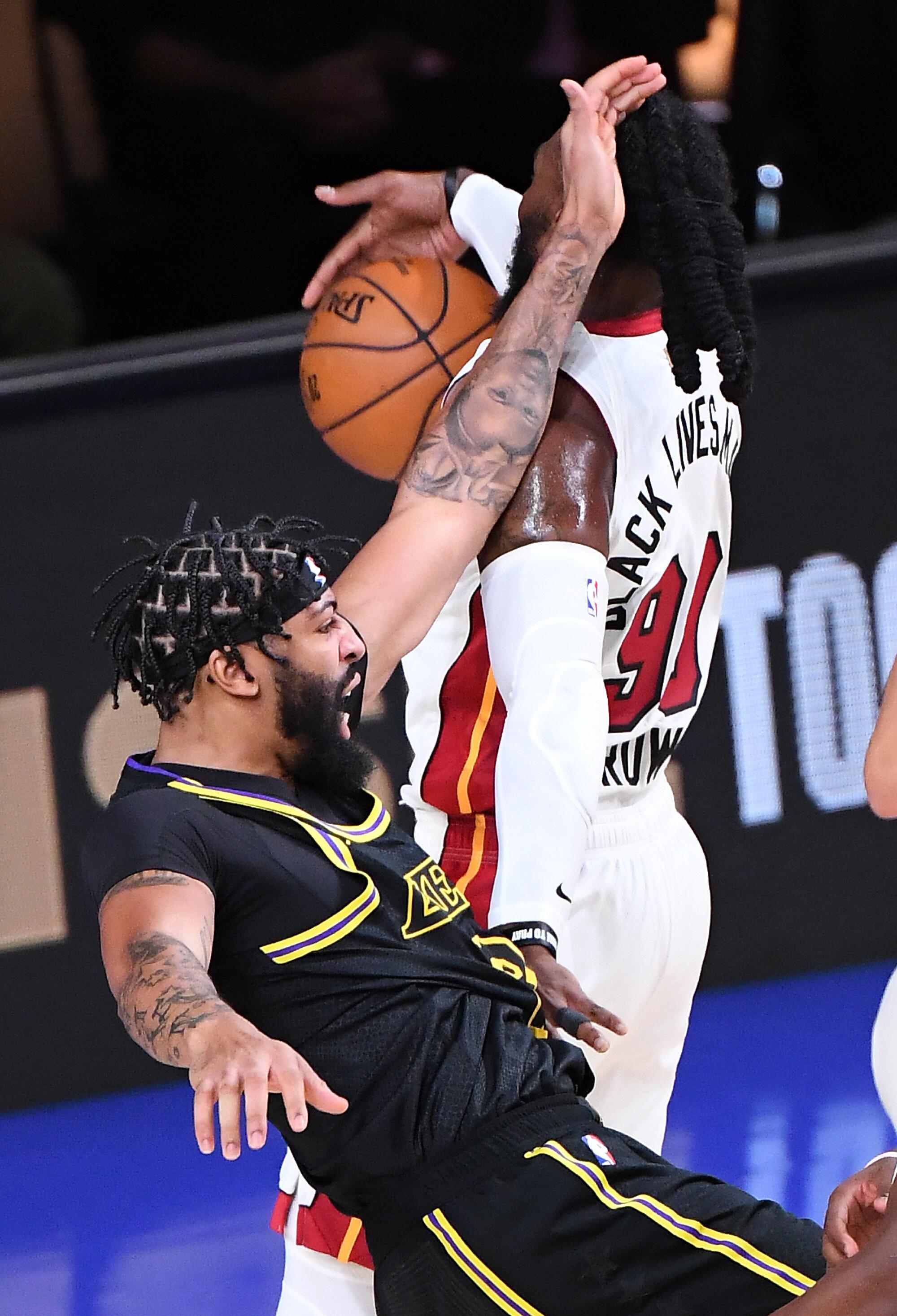 Lakers forward Anthony Davis and Miami's Jae Crowder collide during the second quarter of Game 2 of the NBA Finals.