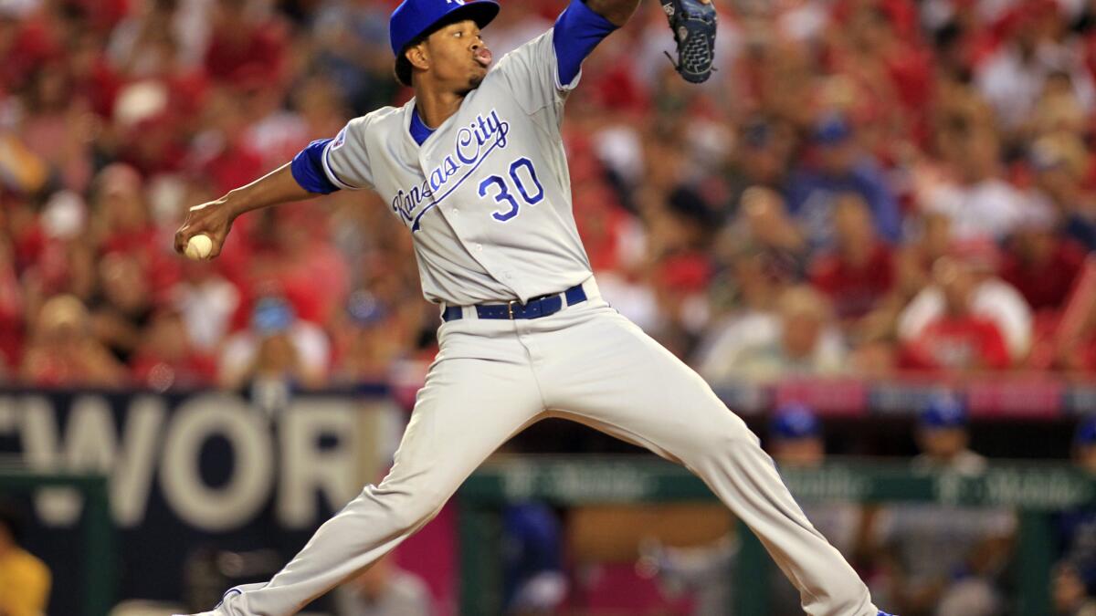 Kansas City Royals pitcher Yordano Ventura (30) talks with catcher