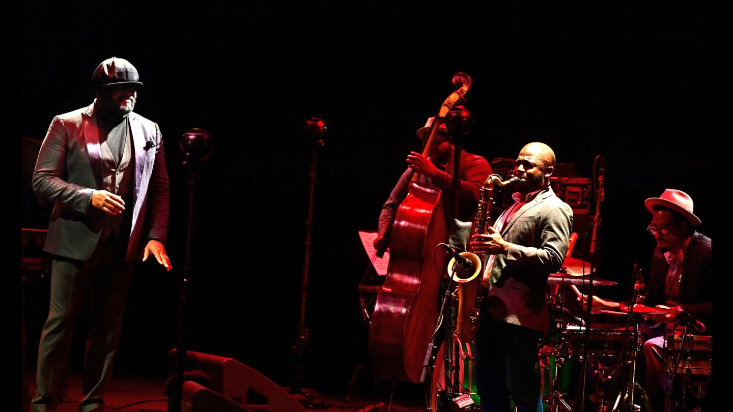 Jazz singer Gregory Porter, left, bassist Jahmal Nichols, tenor saxophonist Tivon Pennicott and drummer Emanuel Harrold are seen performing Wednesday at the Theatre at Ace Hotel.