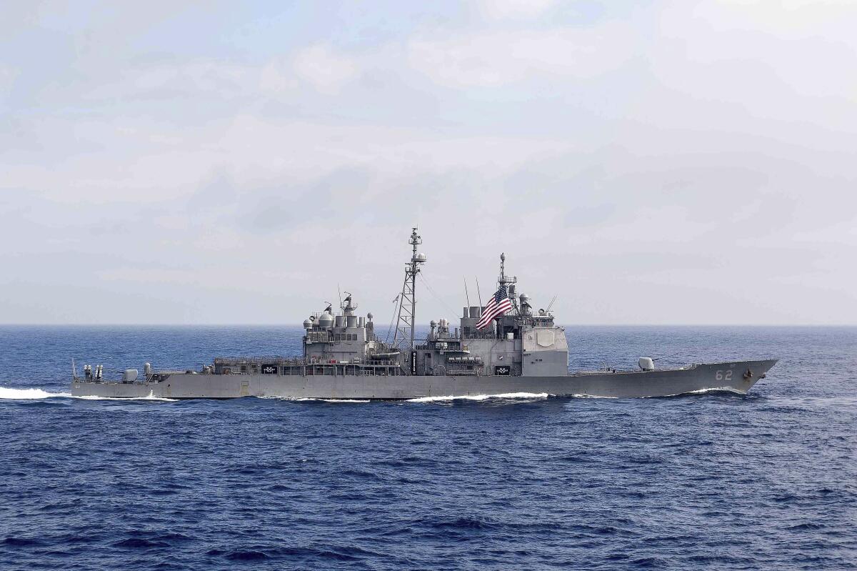 The USS Chancellorsville transits the Philippine Sea.