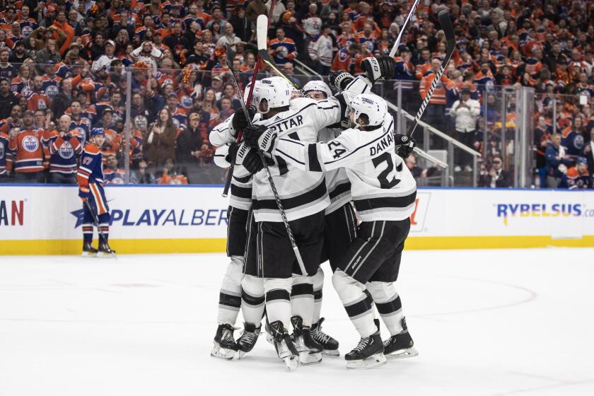 Los Angeles Kings celebrate a goal against the Edmonton Oilers during the third period of Game 1 of an NHL Stanley Cup first-round hockey playoff series in Edmonton, Alberta, Monday, April 17, 2023. (Jason Franson/The Canadian Press via AP)