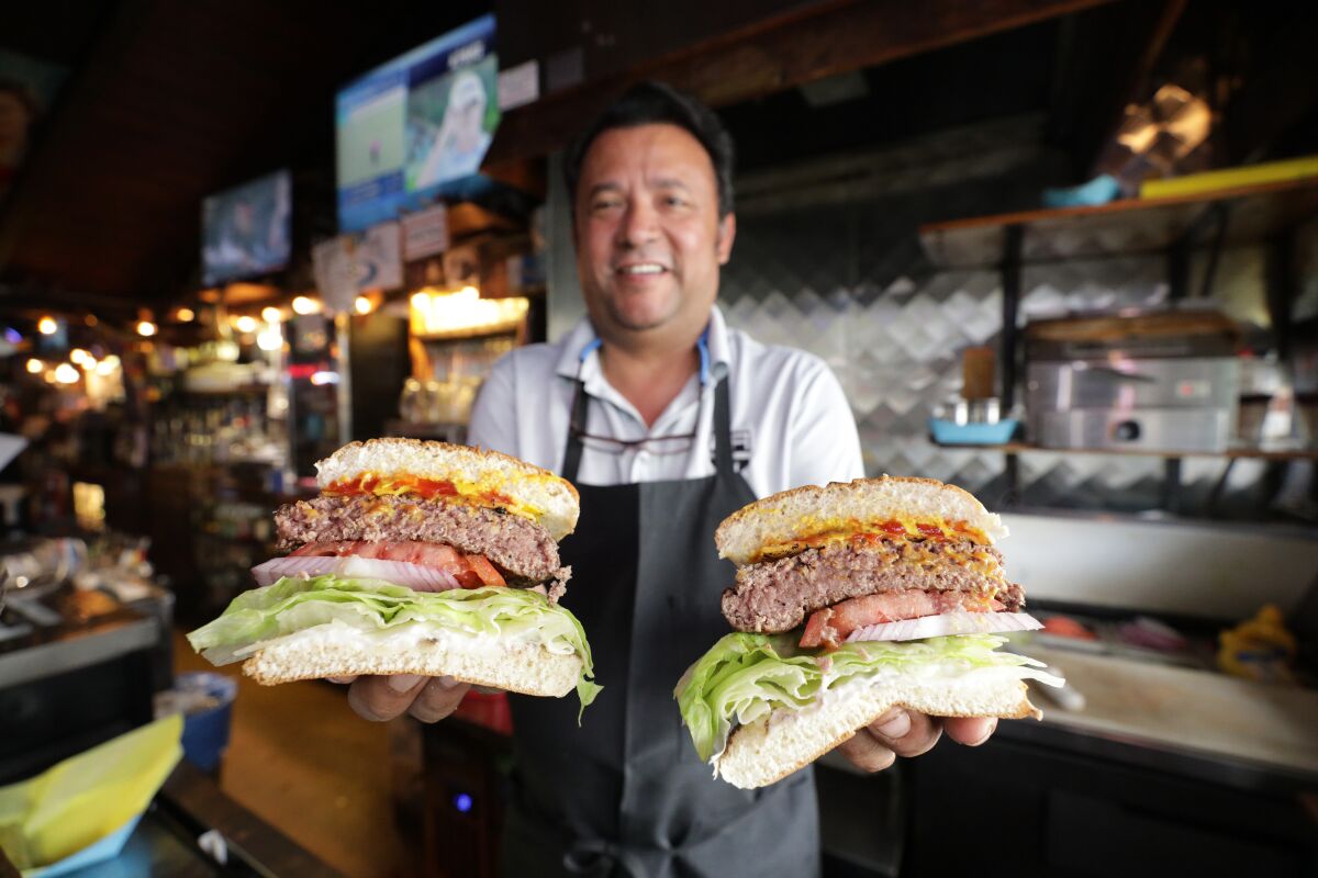 The juicy burgers at Ercoles in Manhattan Beach are cooked just east of done.