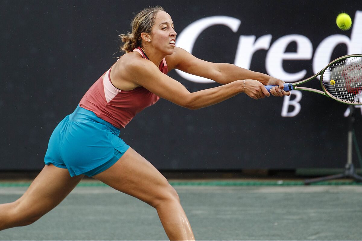 Madison Keys hits a return to Ulrikke Eikeri during the Charleston Open tennis tournament, Wednesday, April 6, 2022, in Charleston, S.C. (Grace Beahm Alford/The Post And Courier via AP)