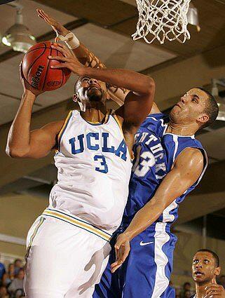 Kentucky forward Bobby Perry, right, fouls UCLA's Josh Shipp as he shoots.