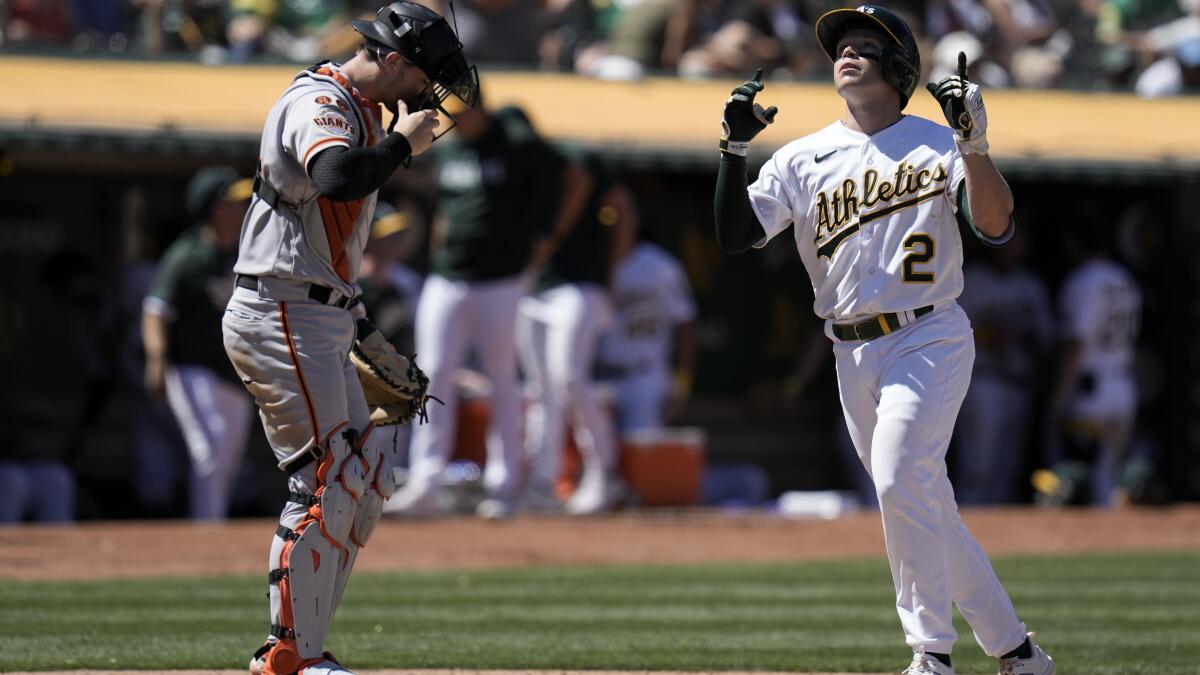 New York Yankees designated hitter Jason Giambi scratches his head