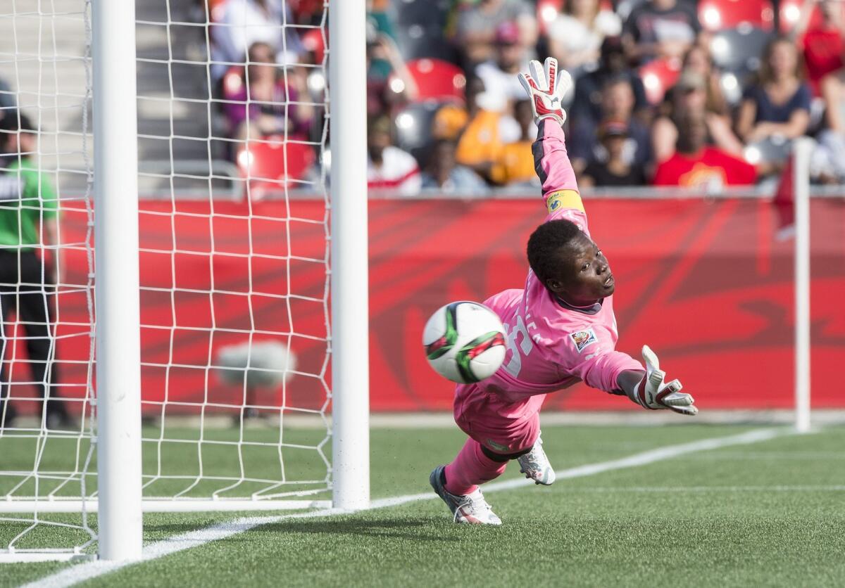 Ivory Coast goalkeeper Dominique Thiamale fails to stop Germany's Alexandra Popp's free-kick during their 10-0 loss.