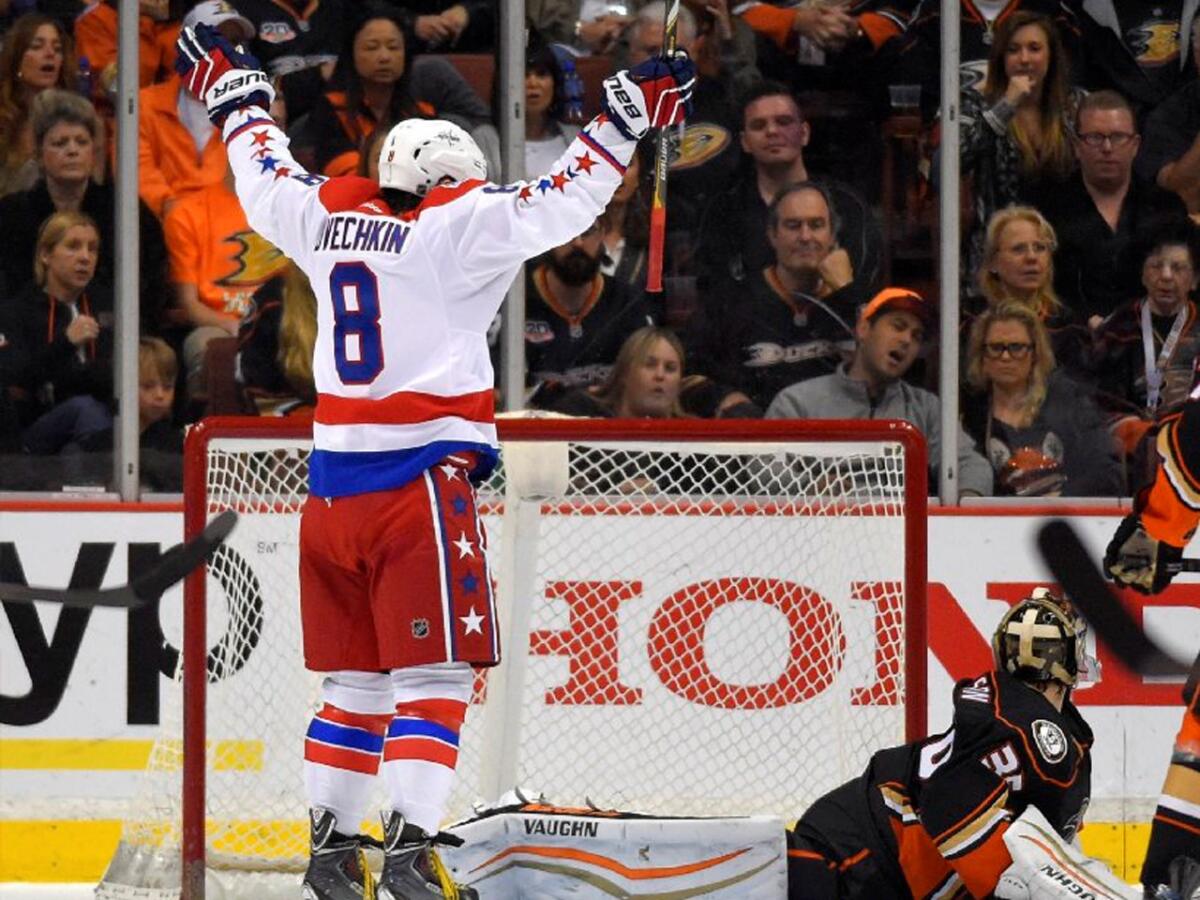 Capitals forward Alex Ovechkin celebrates over Ducks goalie John Gibson after one of Ovechkin's two assists to Andre Burakovsky. Ovechkin also scored twice.