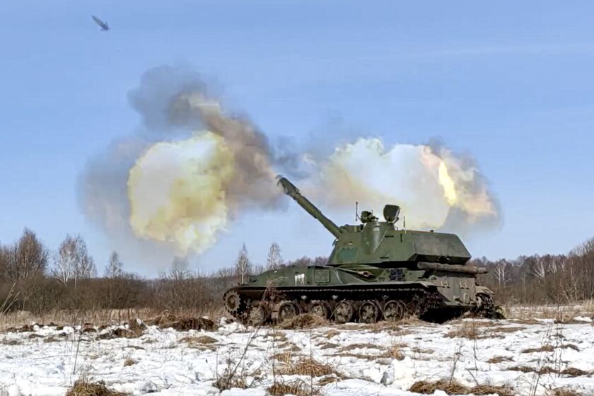 FILE - In this photo taken from video provided by the Russian Defense Ministry Press Service on Tuesday, Feb. 15, 2022, a self-propelled artillery mount fires at the Osipovichi training ground during the Union Courage-2022 Russia-Belarus military drills in Belarus. The Russian invasion of Ukraine is the largest conflict that Europe has seen since World War II, with Russia conducting a multi-pronged offensive across the country. The Russian military has pummeled wide areas in Ukraine with air strikes and has conducted massive rocket and artillery bombardment resulting in massive casualties. (Russian Defense Ministry Press Service via AP, File)