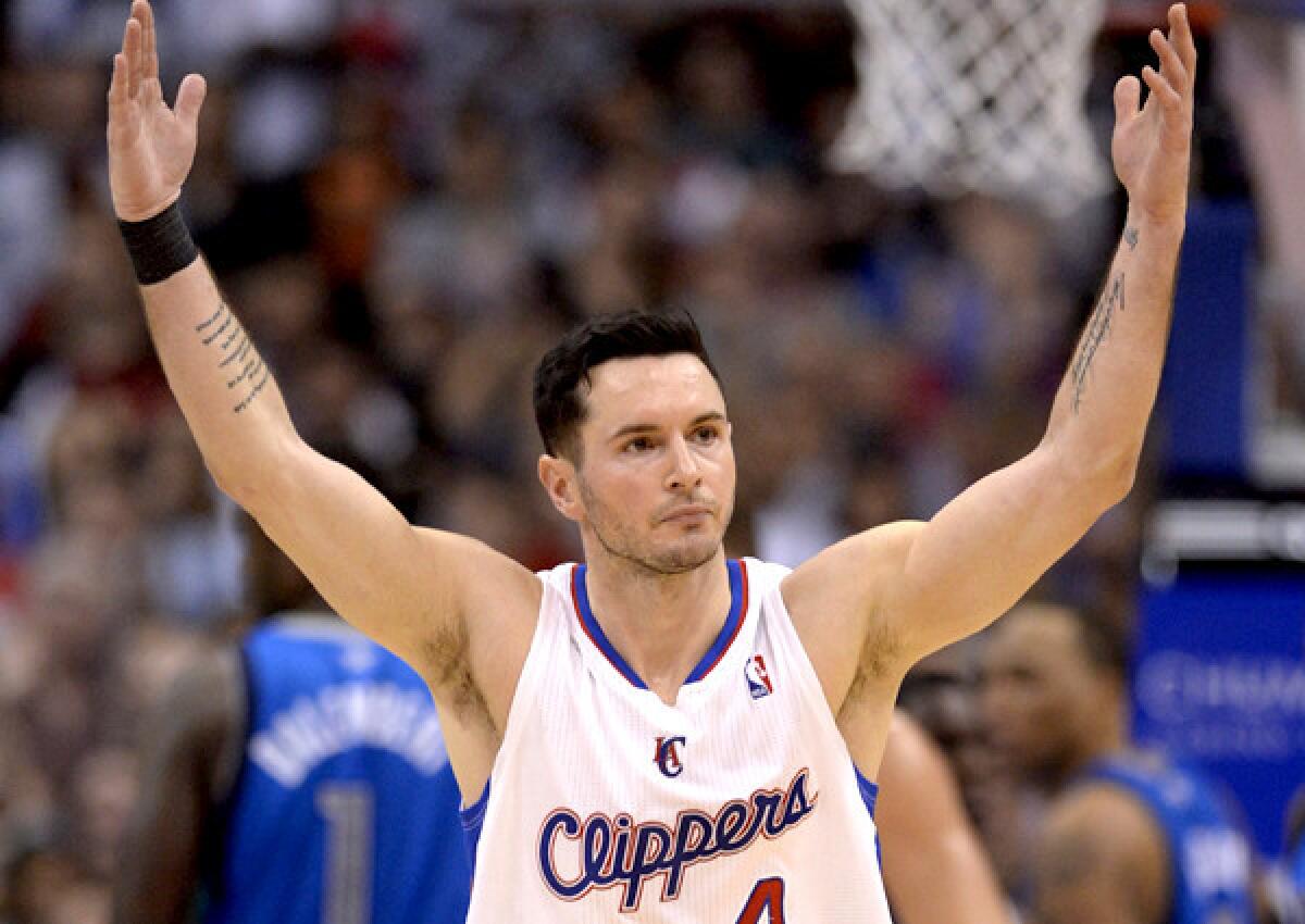 Clippers guard J.J. Redick, celebrating a three-pointer during a victory over Dallas earlier this season, returned to action on Thursday night and scored 12 points in 23 minutes.