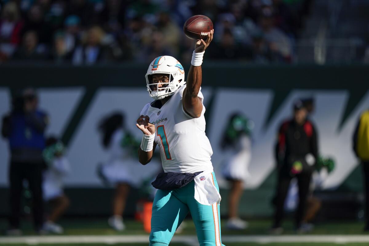 Miami Dolphins quarterback Tua Tagovailoa throws against the New York Jets.