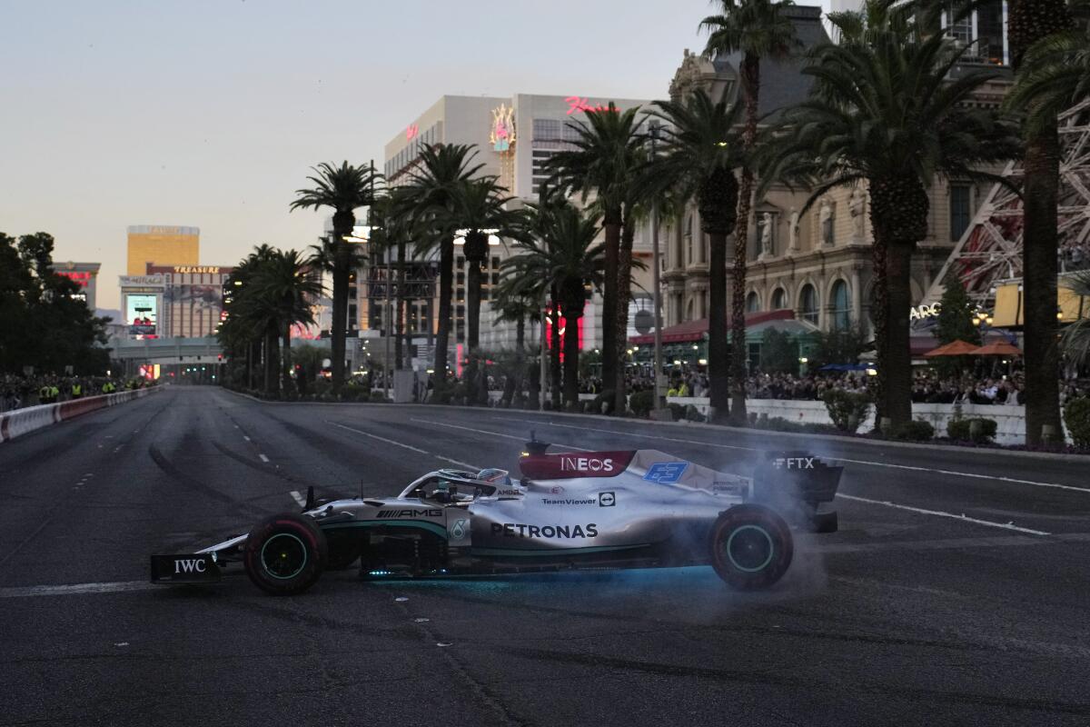 George Russell does a burnout during a demonstration along the Las Vegas Strip.