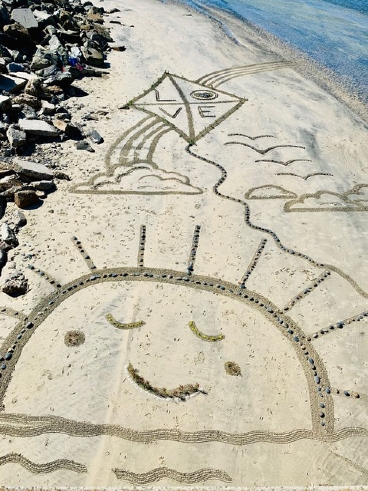 Beach art left behind by local artists last weekend in Cardiff.