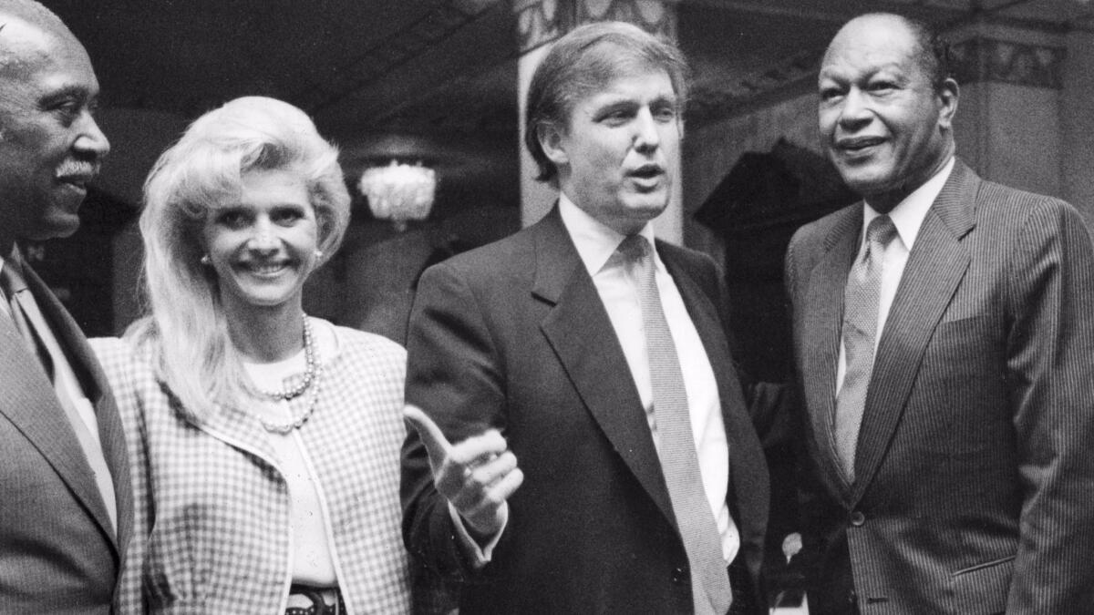 Nate Holden, left, Ivana Trump, Donald Trump and Tom Bradley in 1990.