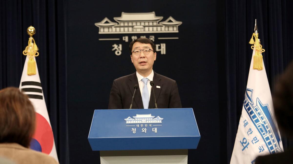 Yoon Young-chan, South Korean President Moon Jae-in's press secretary, briefs reporters on March 4, 2018, about plans to send a 10-member delegation to North Korea this week to discuss peace on the Korean peninsula.