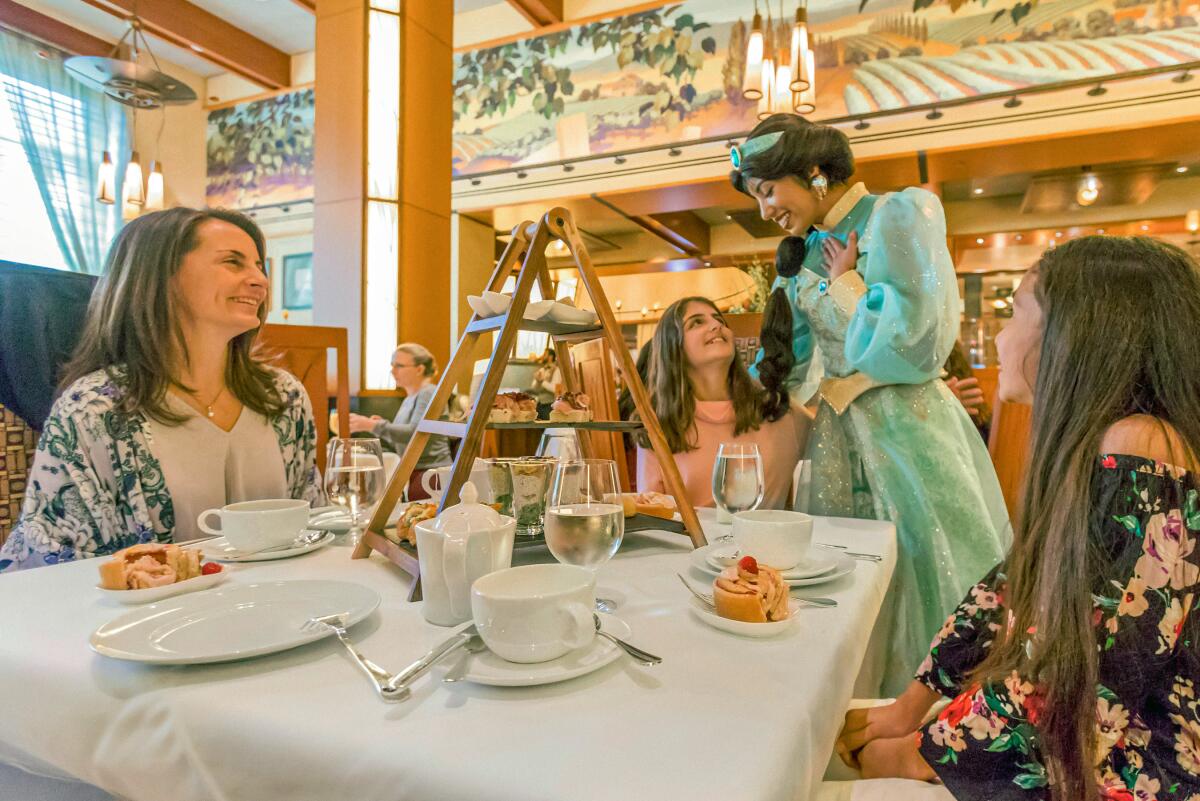 Princess Jasmine visits a family having breakfast at Napa Rose restaurant.