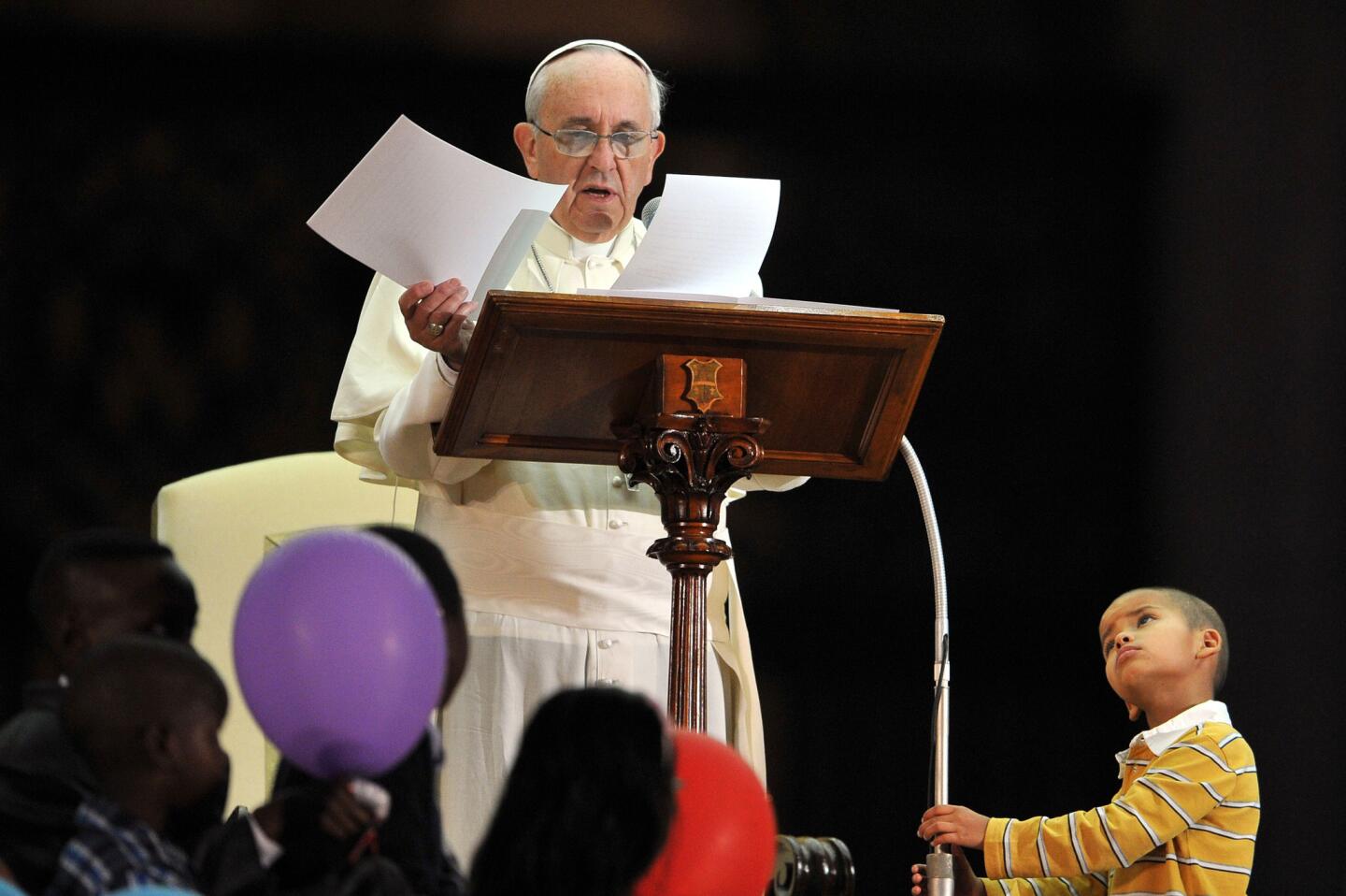 Boy joins Pope Francis onstage
