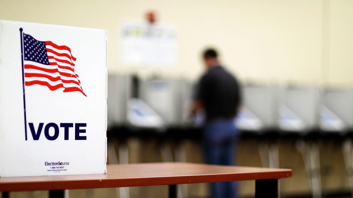 A voter in Sandy Springs, outside Atlanta, casts his ballot June 20 in Georgia's 6th Congressional District special election.