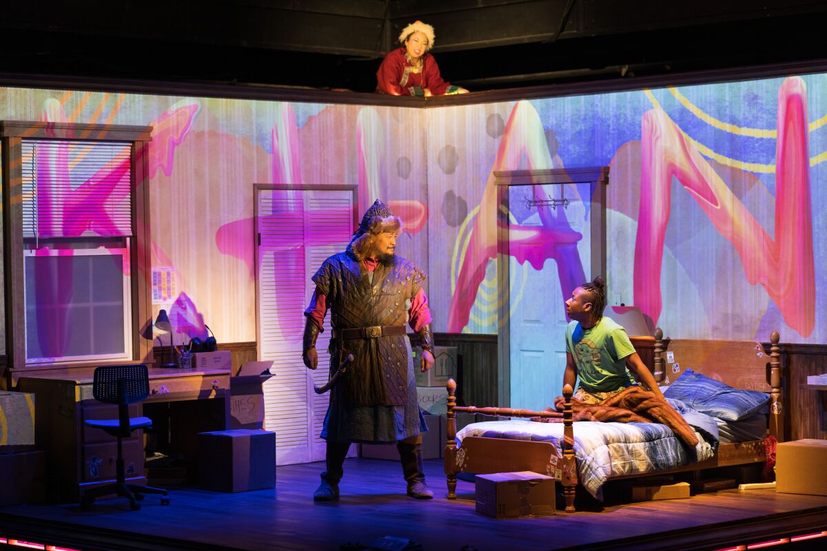 Brian Rivera, Molly Adea, top, and Jerome Beck in San Diego Repertory Theatre’s "The Great Khan."
